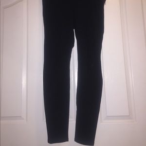 Black trousers with side zipper